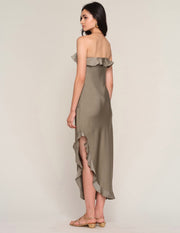 Back view of Woman wearing a strapless ruffle dress in olive green