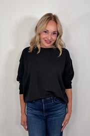 woman wearing a black pullover 