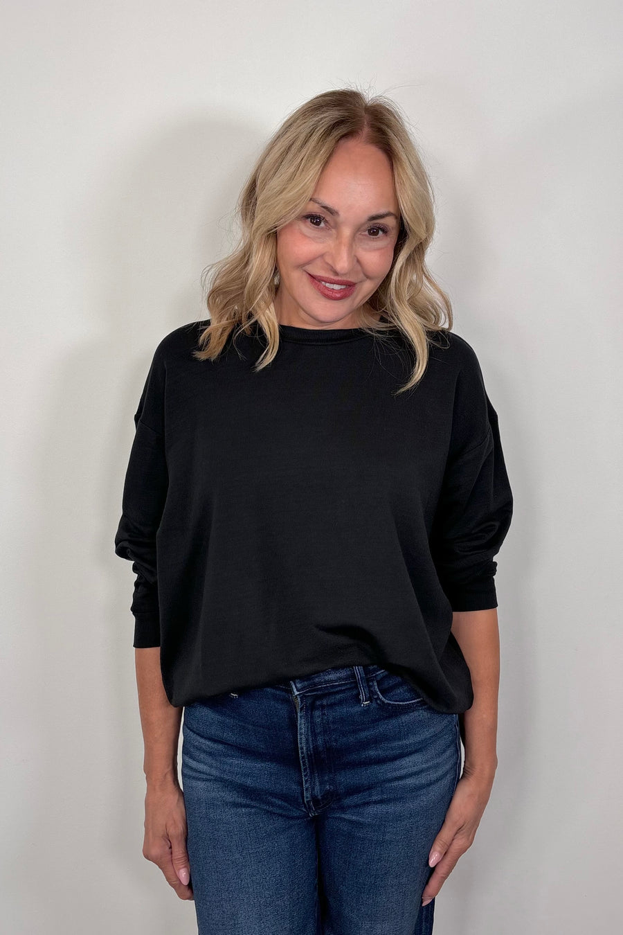 woman wearing a black pullover 
