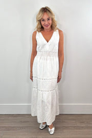 Woman wearing knit white dress