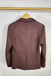 Back view of a brown jacket on a hanger against a white background