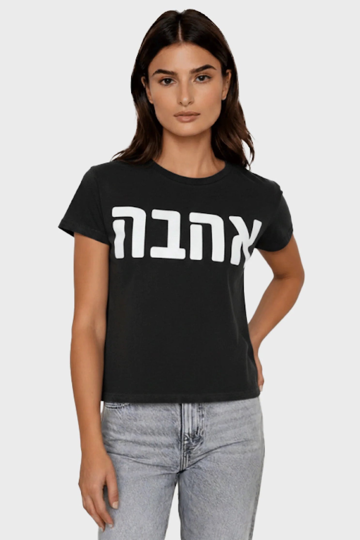 Woman wearing a black t-shirt with "love" written in Hebrew