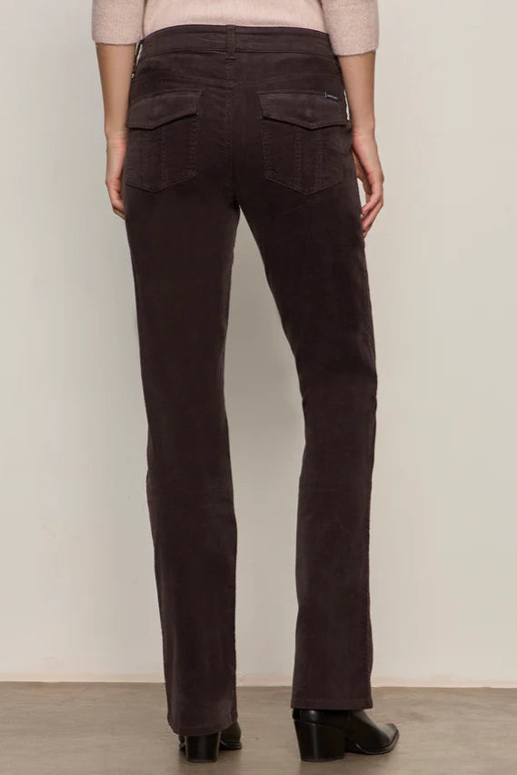 Dark brown corduroy pants worn by a person on a plain background