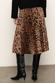 Back view of a woman wearing a leopard printed midi skirt 