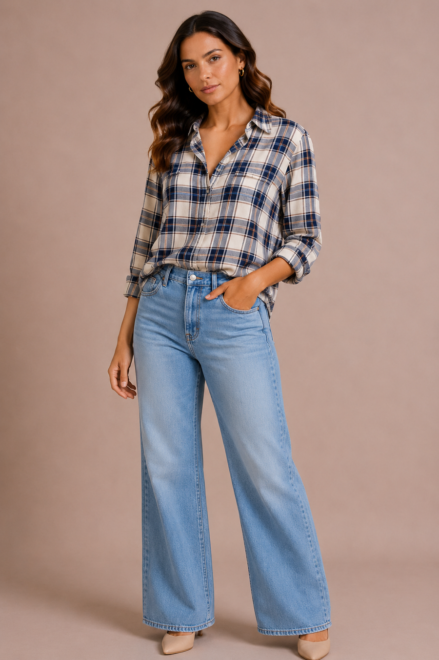 Woman wearing a button up plaid shirt