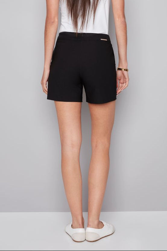 woman wearing black pull on shorts