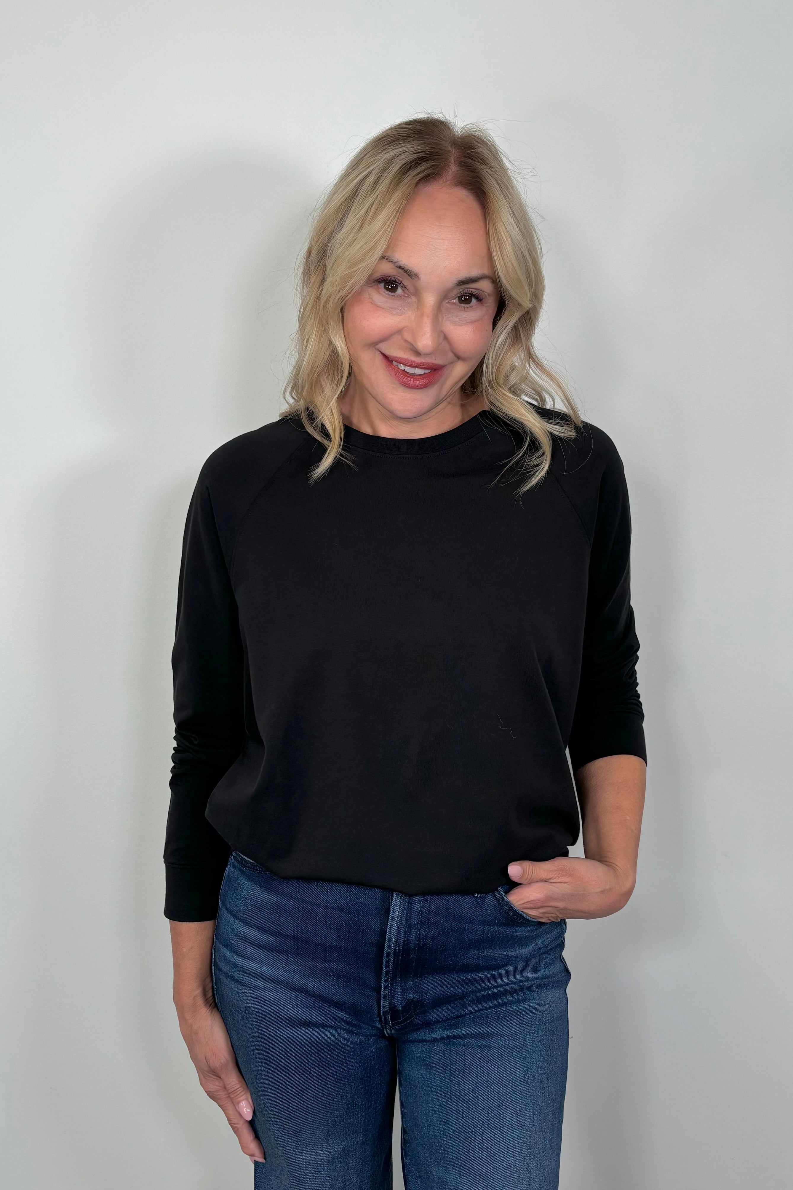 woman wearing a black pullover 