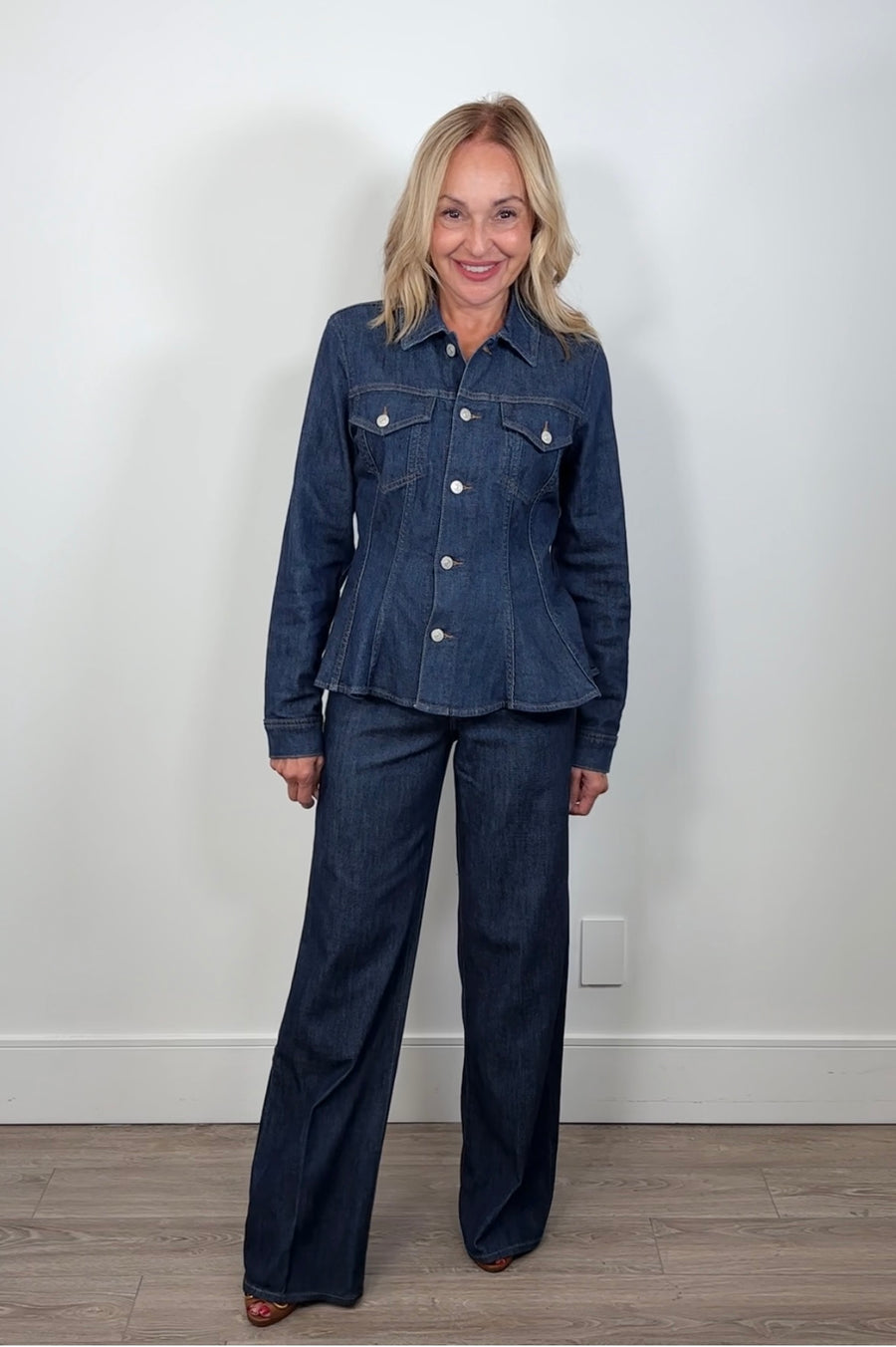 woman wearing a denim top with matching wide leg blue jeans