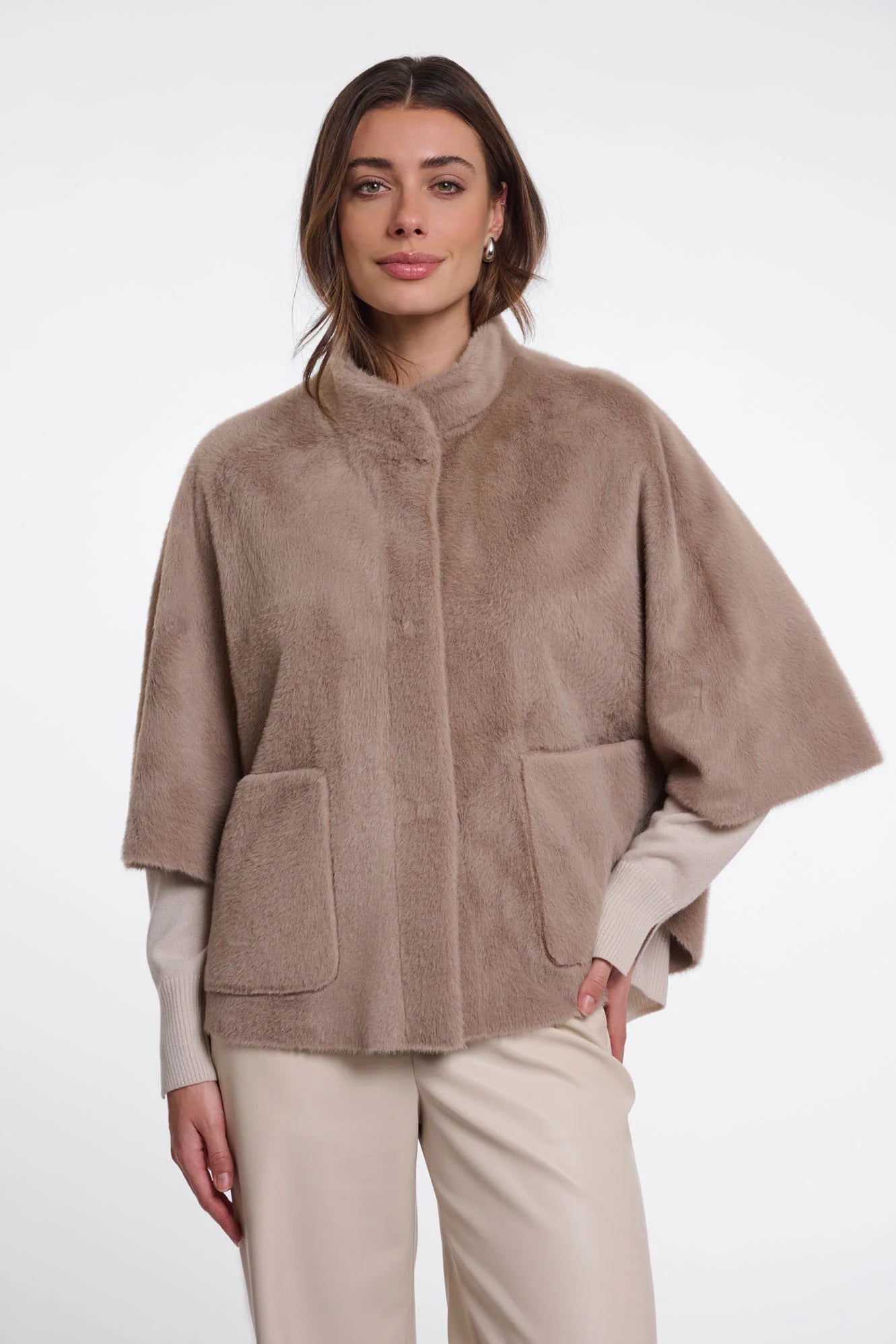woman wearing brown fur high neck cape