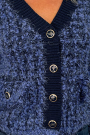 Close-up of blue fluffy cardigan 