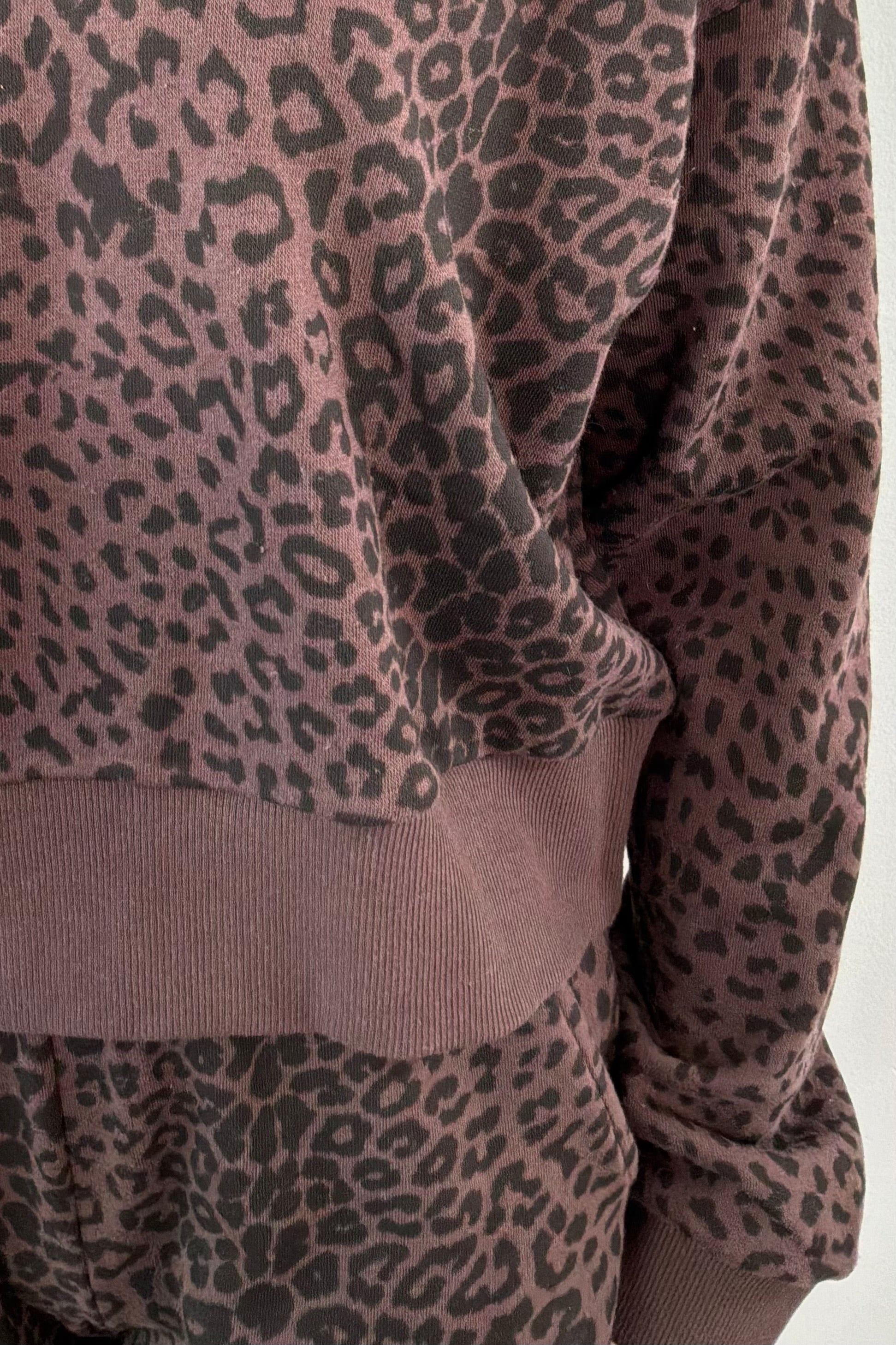close-up of a leopard print sweatshirt