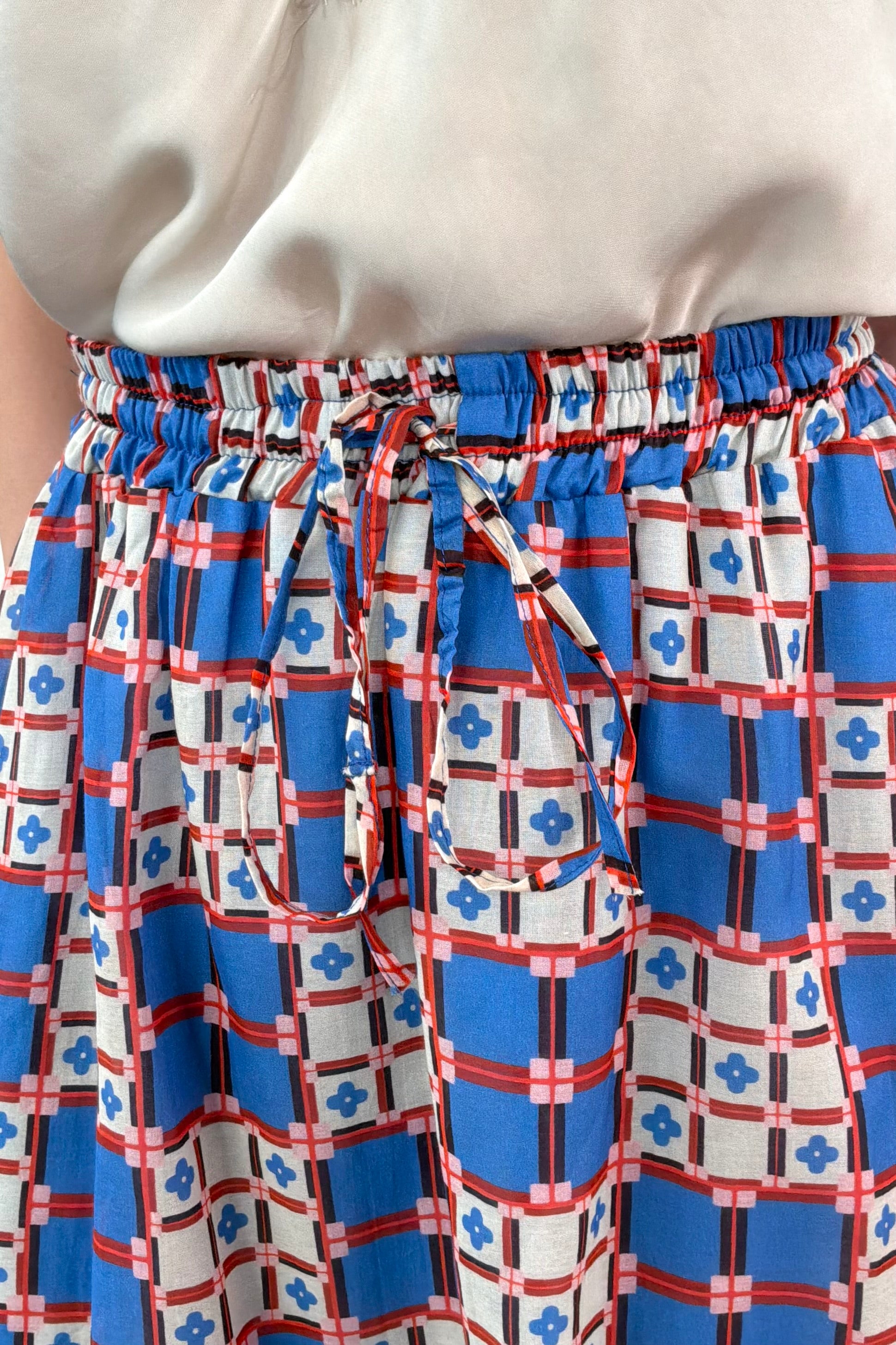 close-up of an azulejos patterned midi skirt 