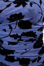 close-up of a sleeveless navy mesh top with black floral pattern 