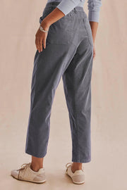 woman wearing navy  high waisted wide leg pants 