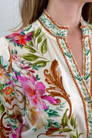 Close-up of  an ivory regency printed button down shirt