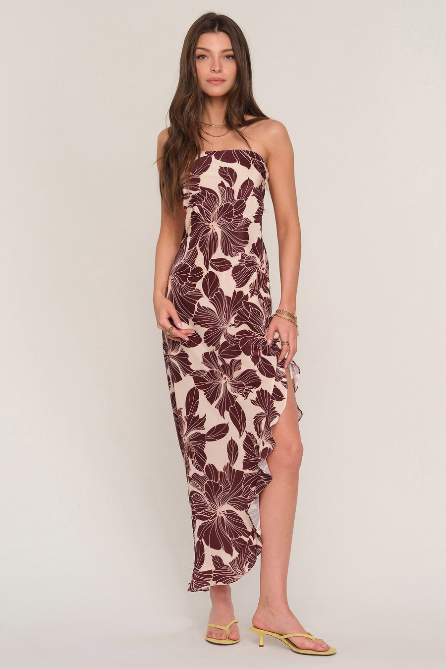 women wearing printed midi dress with asymmetrical hem