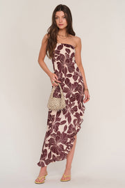 women wearing printed midi dress with asymmetrical hem
