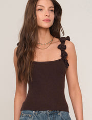 women wearing brown knit tank top with floral straps. 