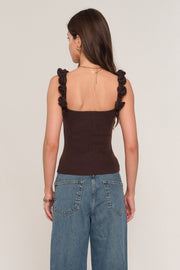women wearing brown knit tank top with floral straps. 
