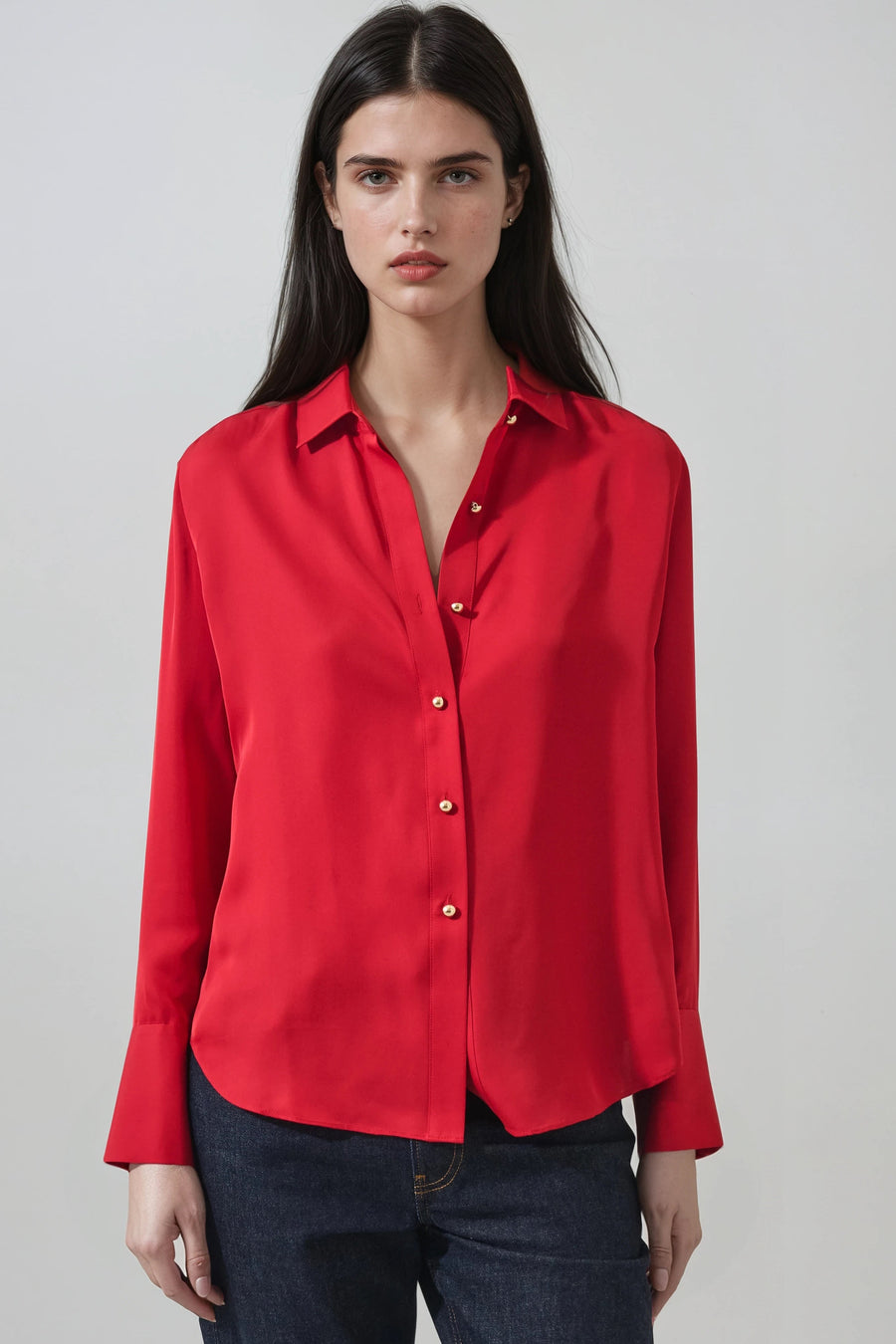 model wearing red long sleeve collard shirt, button down with pearl buttons 