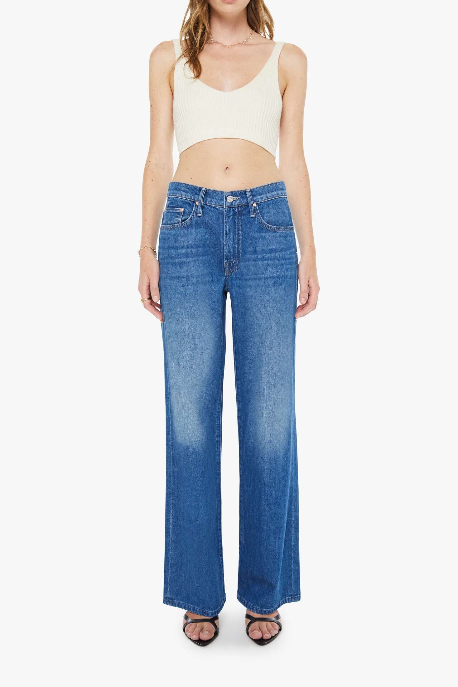 Woman wearing mid indigo wide leg jeans