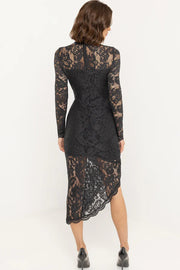 Black lace dress worn by a person on a white background