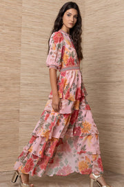 Woman wearing a floral dress.