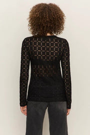 woman wearing a long sleeve mesh tee