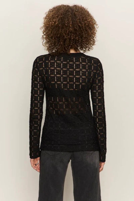 woman wearing a long sleeve mesh tee