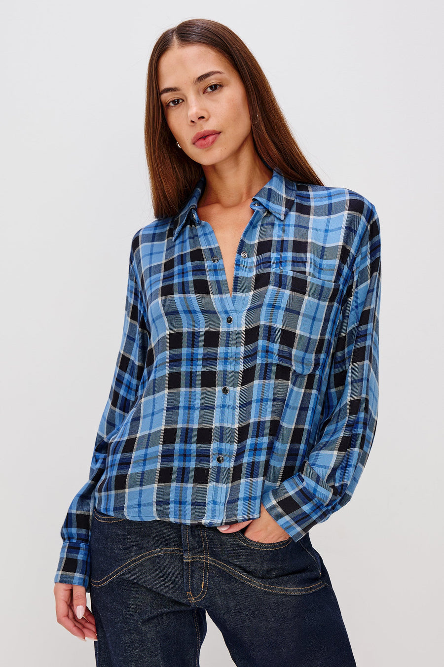 woman wearing blue plaid button up