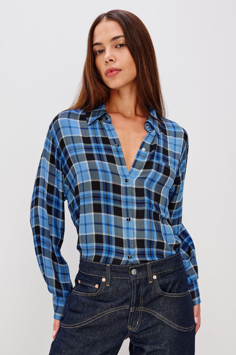 woman wearing blue plaid button up