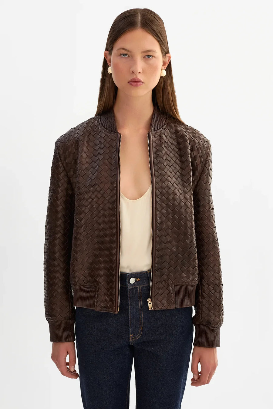 woman wearing brown basket weave jacket 