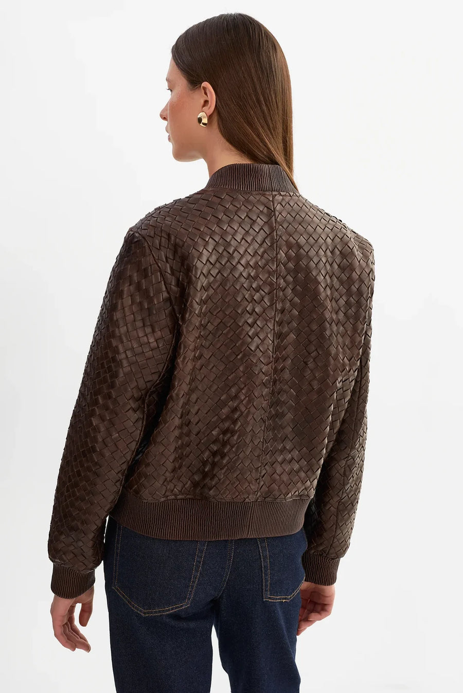 woman wearing brown basket weave jacket 