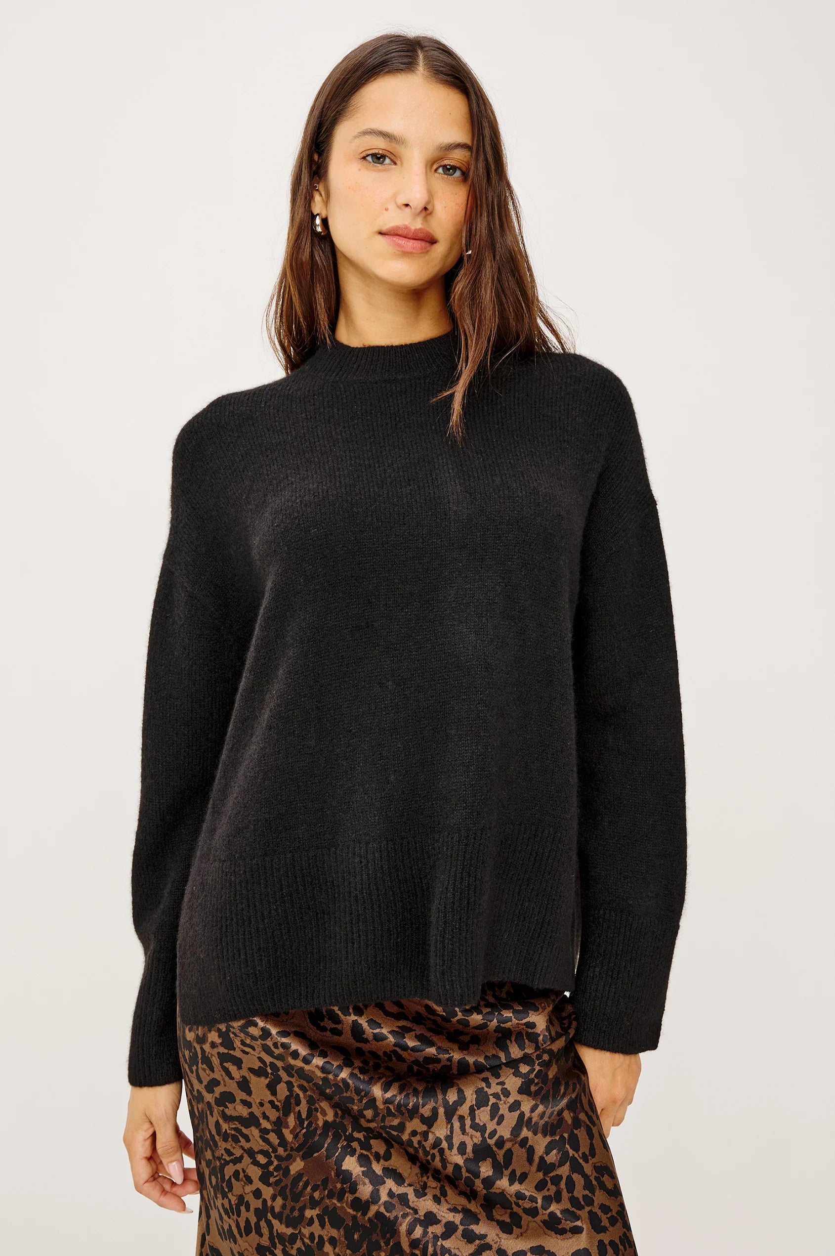woman wearing black cashmere blend sweater