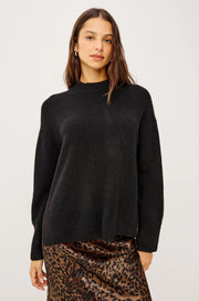 woman wearing black cashmere blend sweater