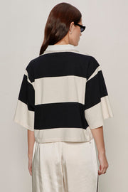 back view of black and white striped half sleeve polo with embellished collar