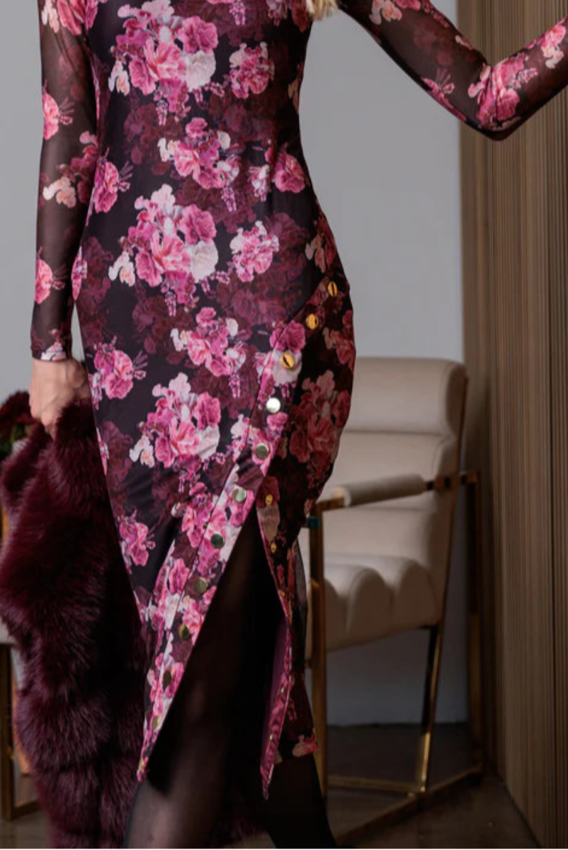 Close-up view of a midi long sleeve lined mesh floral dress
