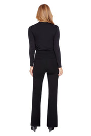 Person wearing a black suit on a white background