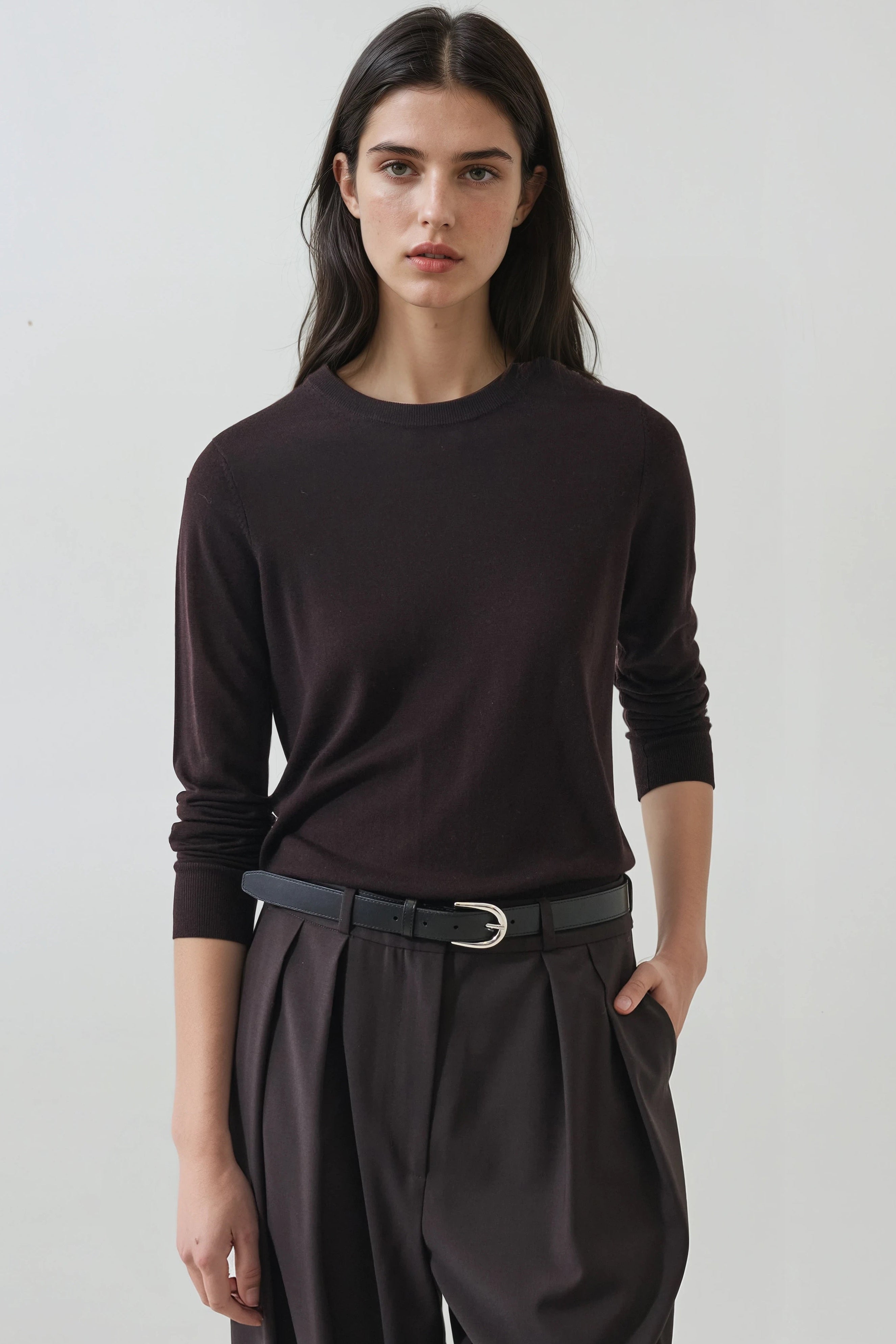 model wearing dark brown crew beck sweater 
