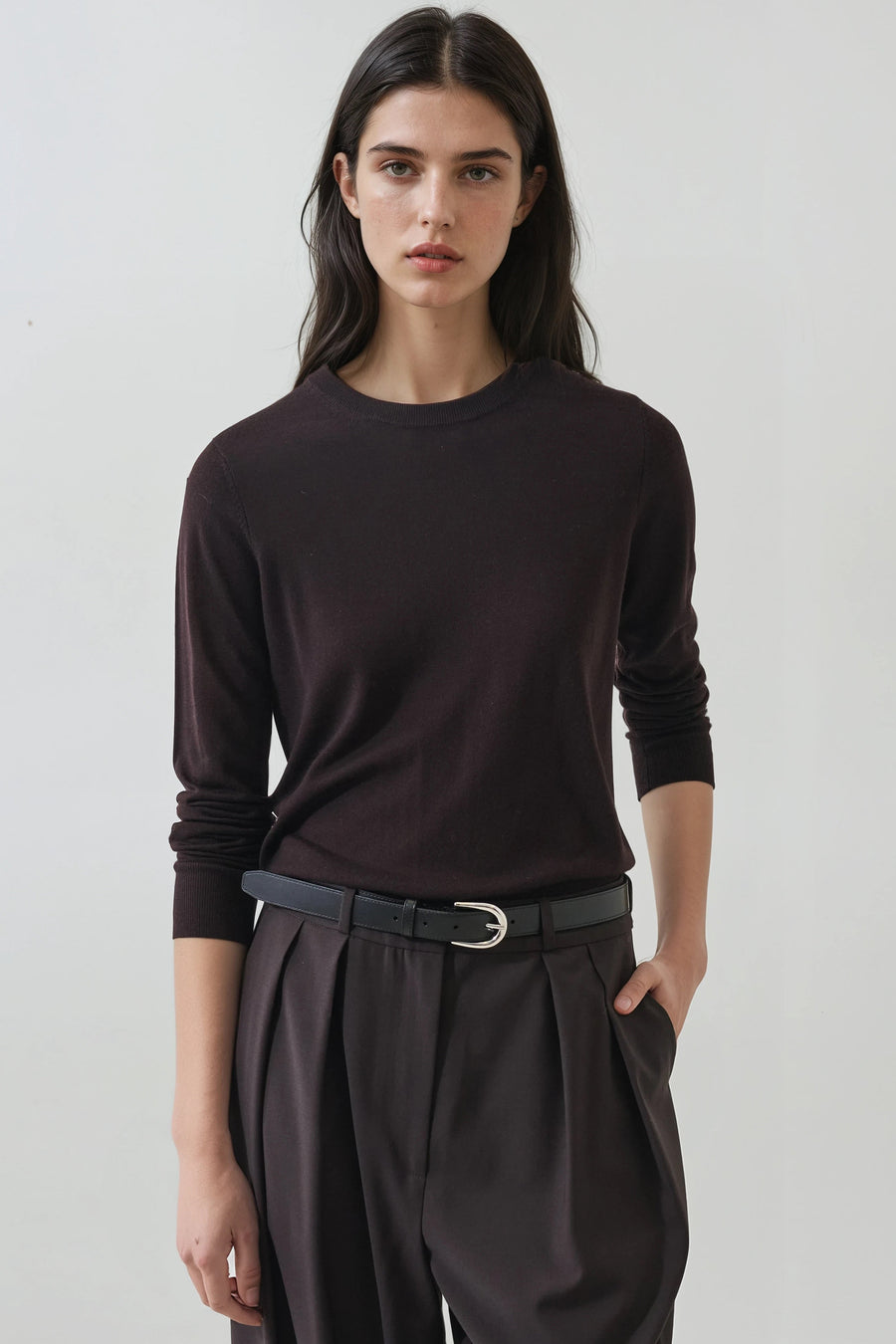 model wearing dark brown crew beck sweater 