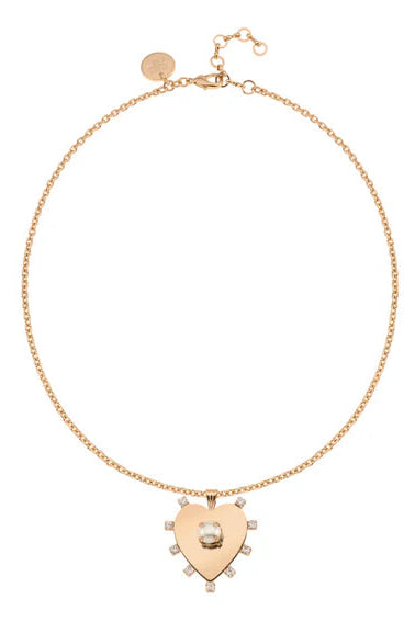 Gold necklace with a heart-shaped pendant on a white background