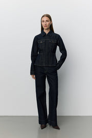 Women wearing dark denim peplem jacket 