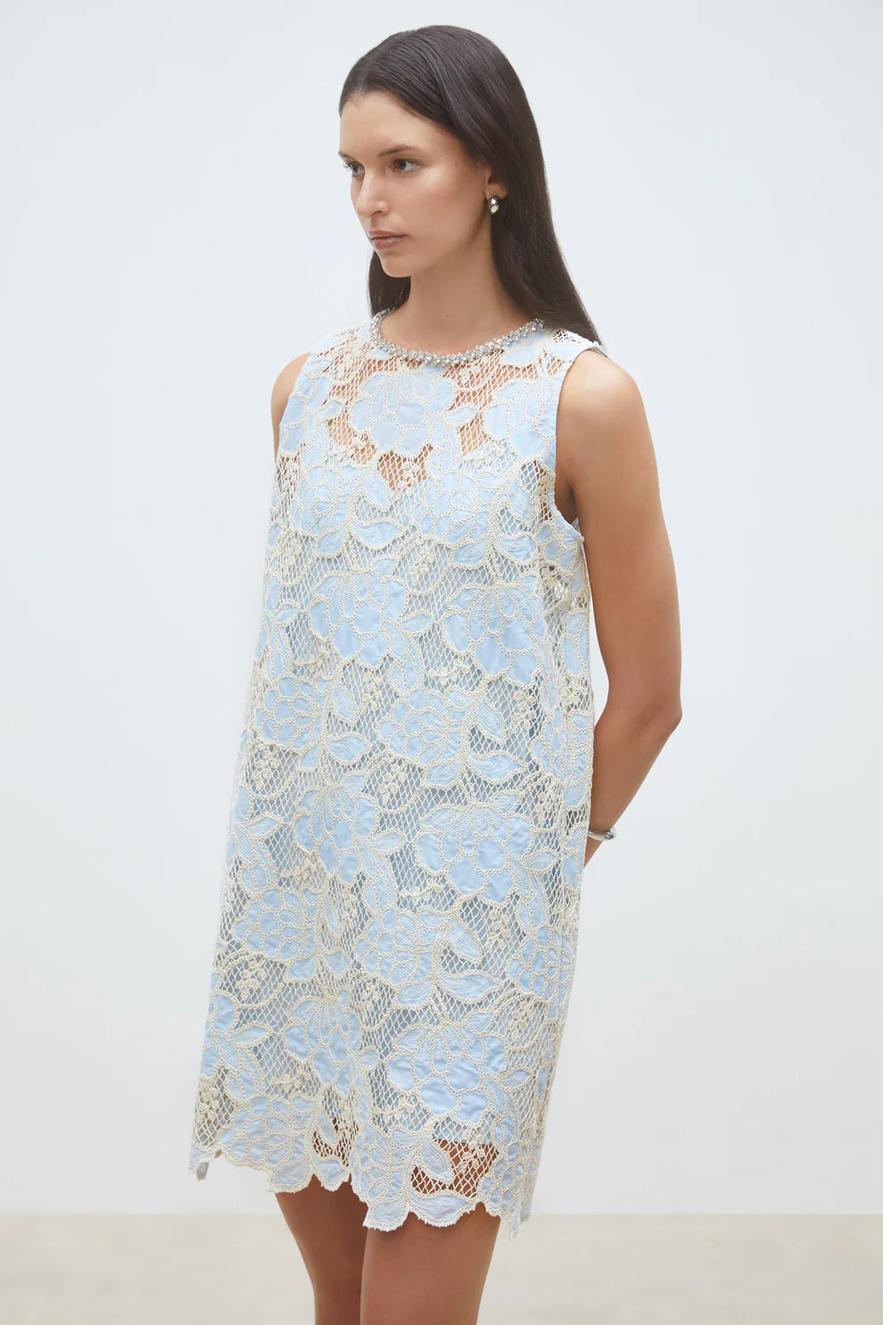 woman wearing a light blue floral dress
