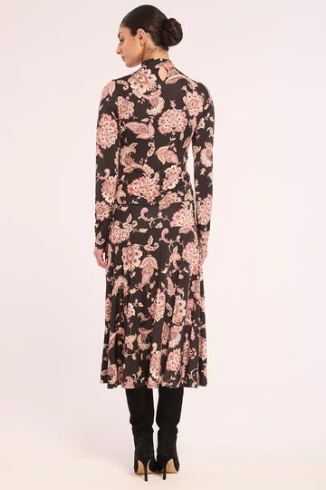 woman wearing midi length printed A line skirt.