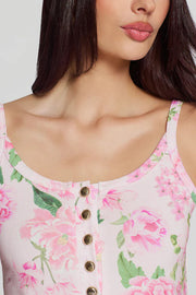 Floral print sleeveless tank top with thin straps, scoop neckline, and front button detail, detail