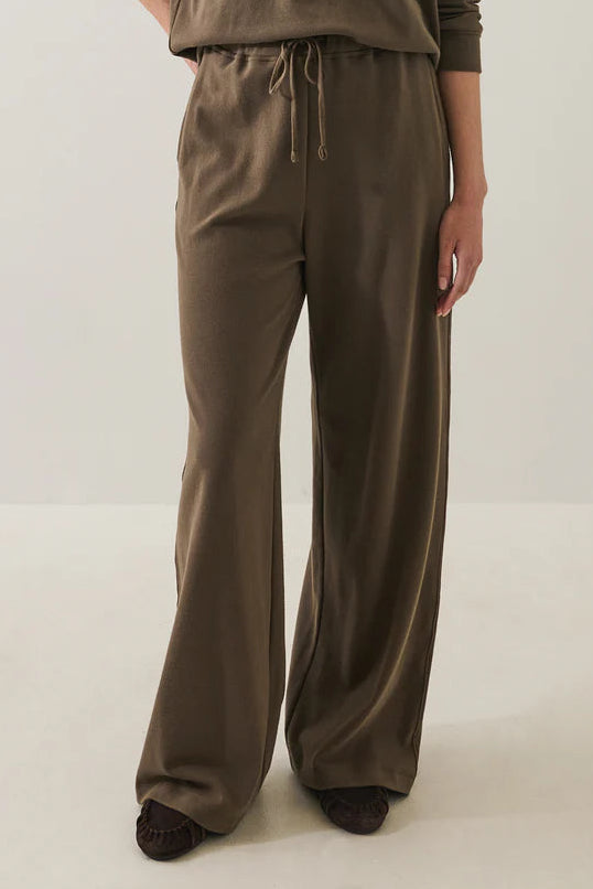woman wearing a Pima cotton chestnut brown drawstring jogger