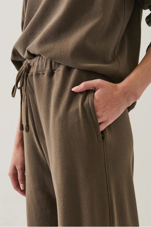 woman wearing a Pima cotton chestnut brown drawstring jogger