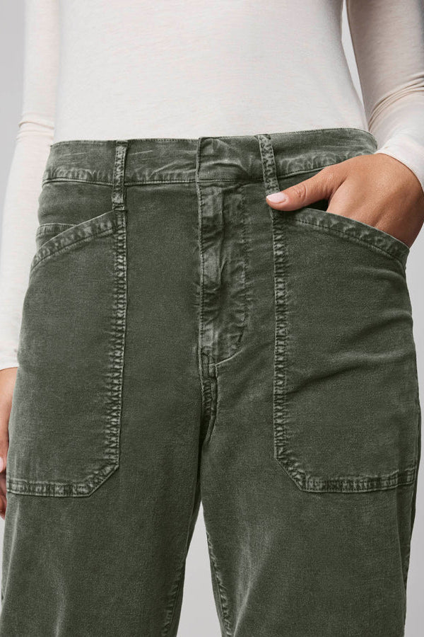 Person wearing green corduroy pants 