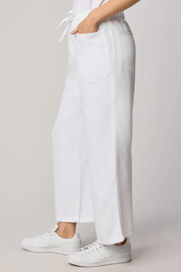 woman wearing a white tencel denim pants