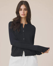 Woman wearing a navy button up cardigan 
